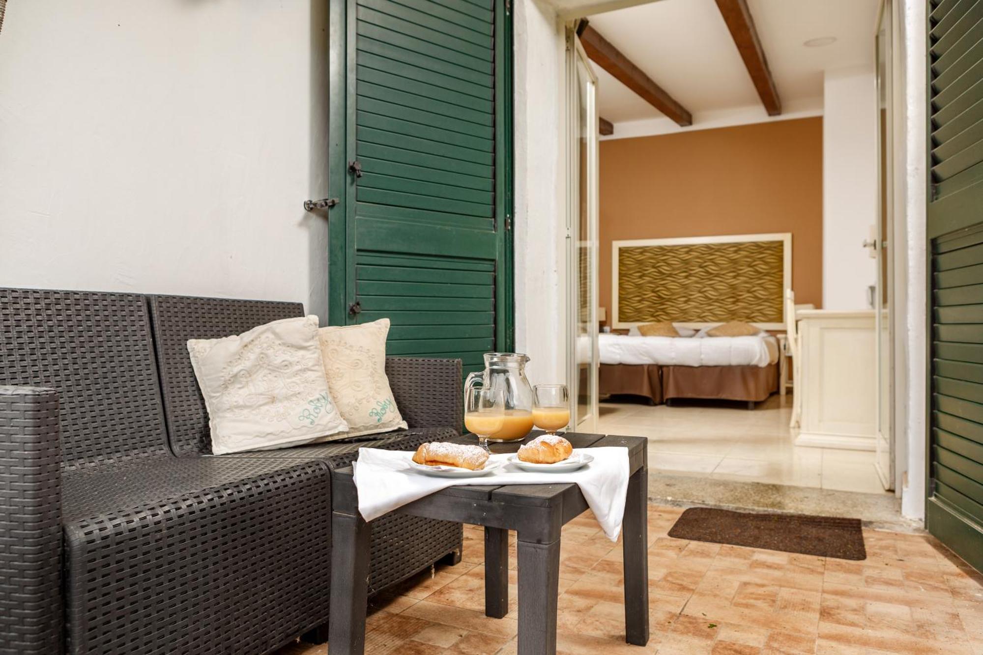 Domus De Vida Hotel Palau Buitenkant foto
